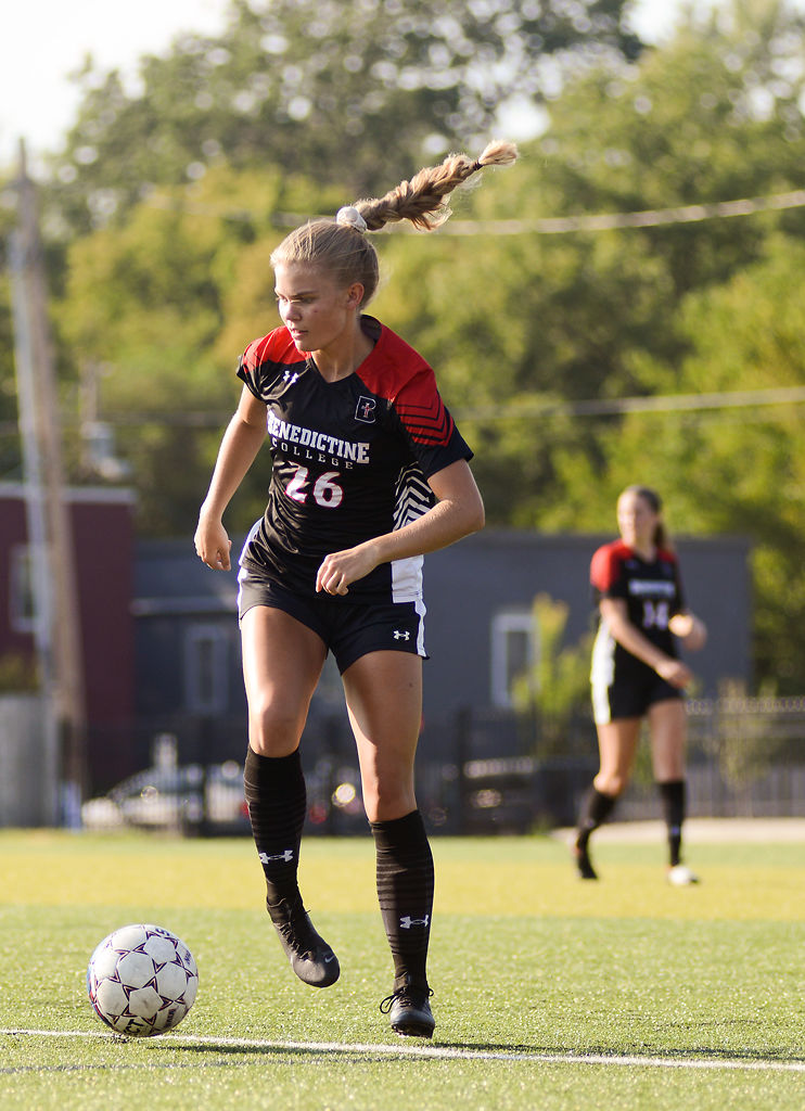 Nicole Patterson dribbles the ball